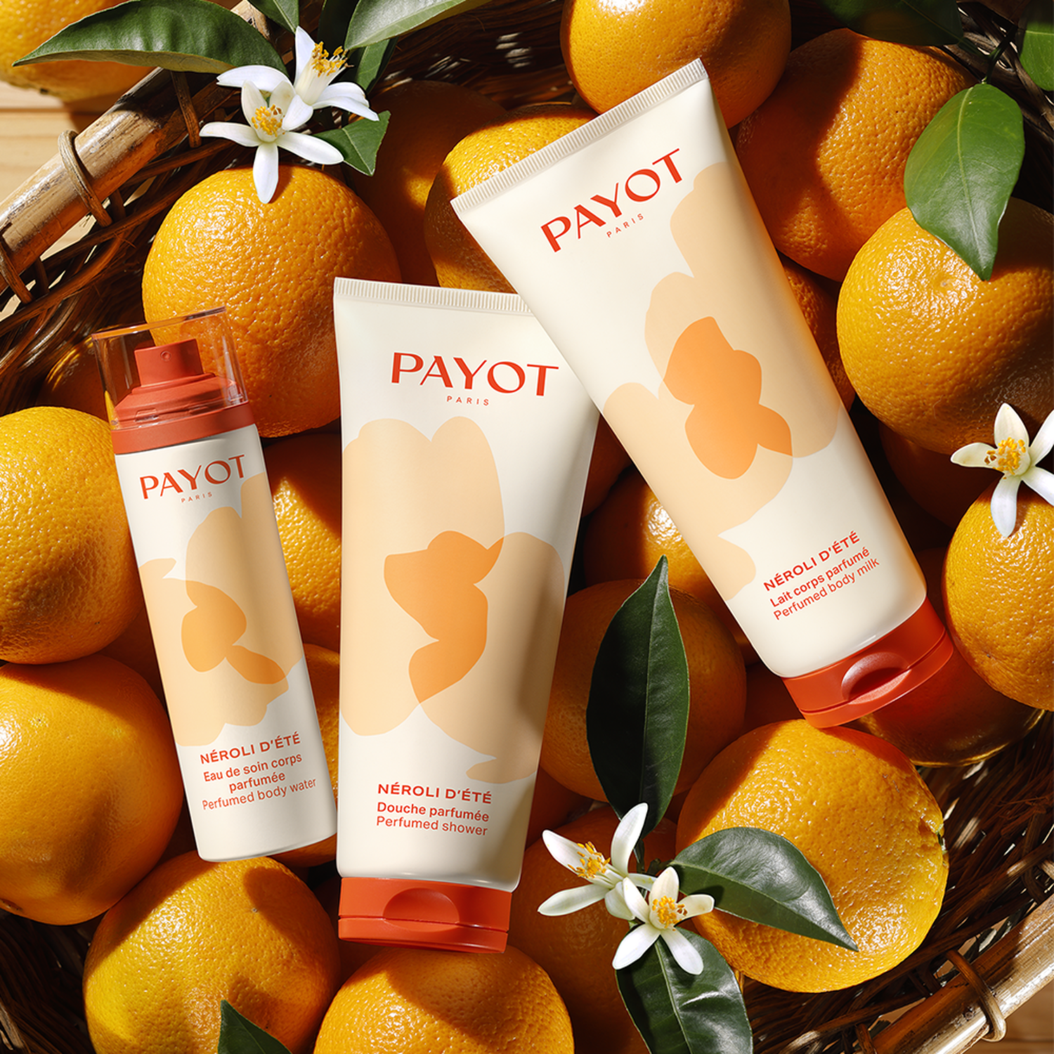 Bottle of Payot Néroli d'Été Scented Care Mist 100ml with summer background and neroli flowers - thumbnail 3